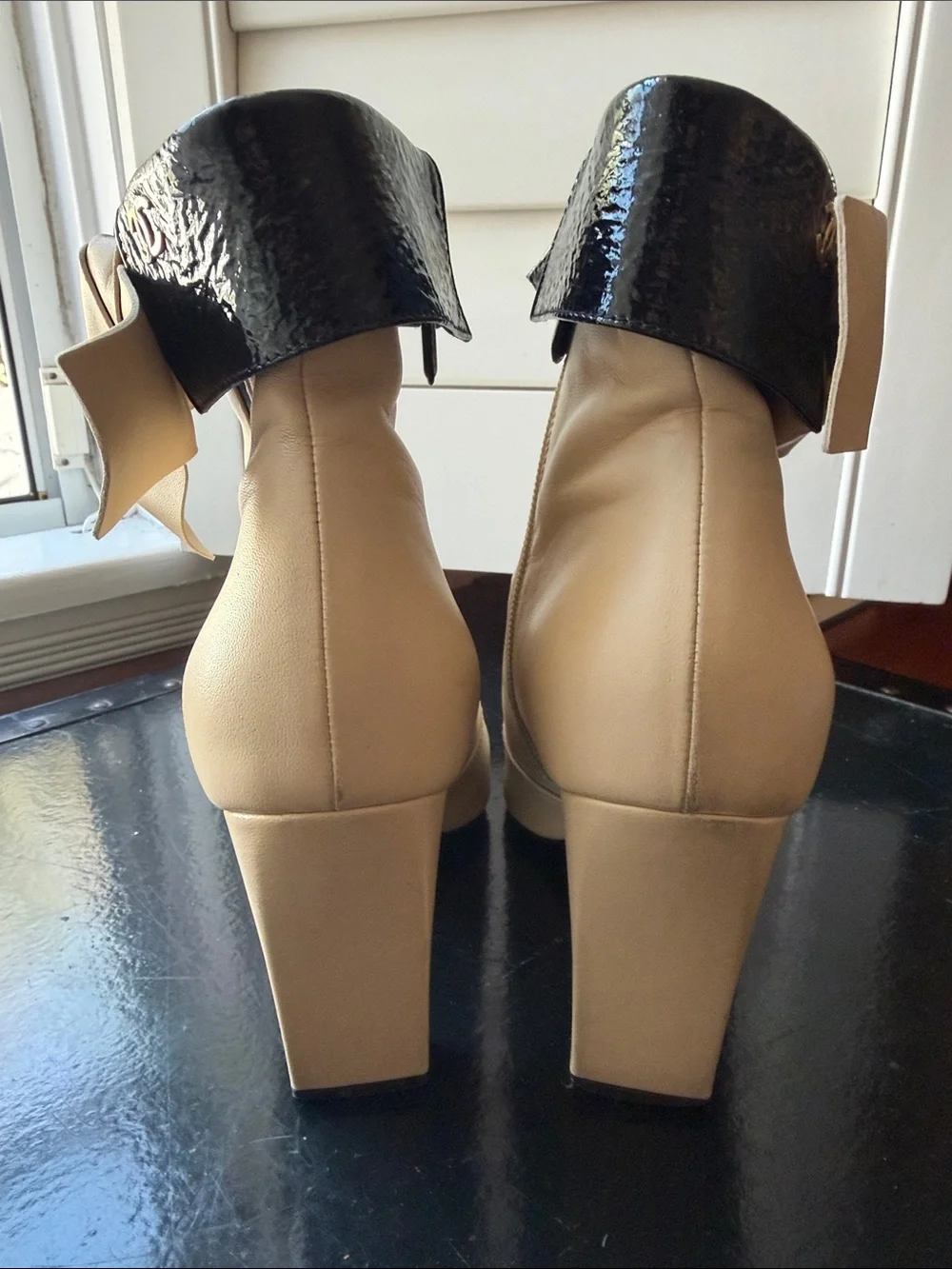 CHANEL Beige and Black Bow Accent Leather Ankle Boots
